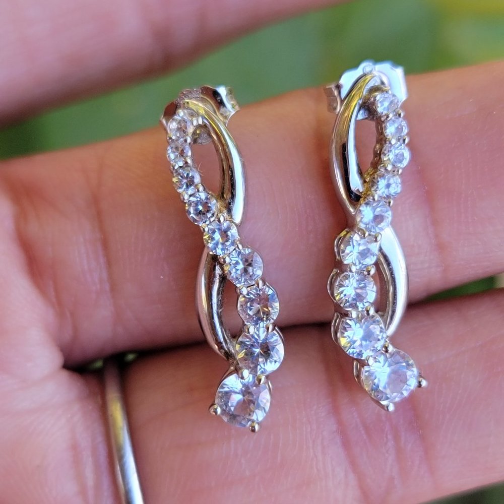 Gorgeous 925 sterling silver bypass journey diamond earrings